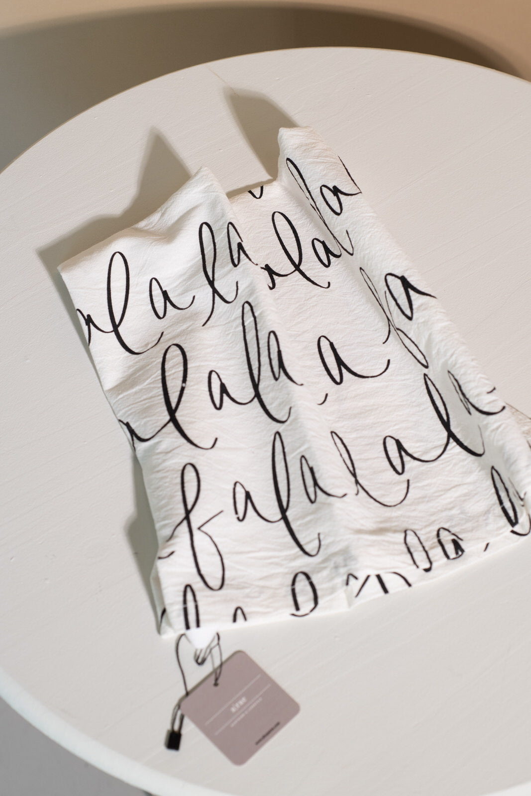 fa la la tea towel