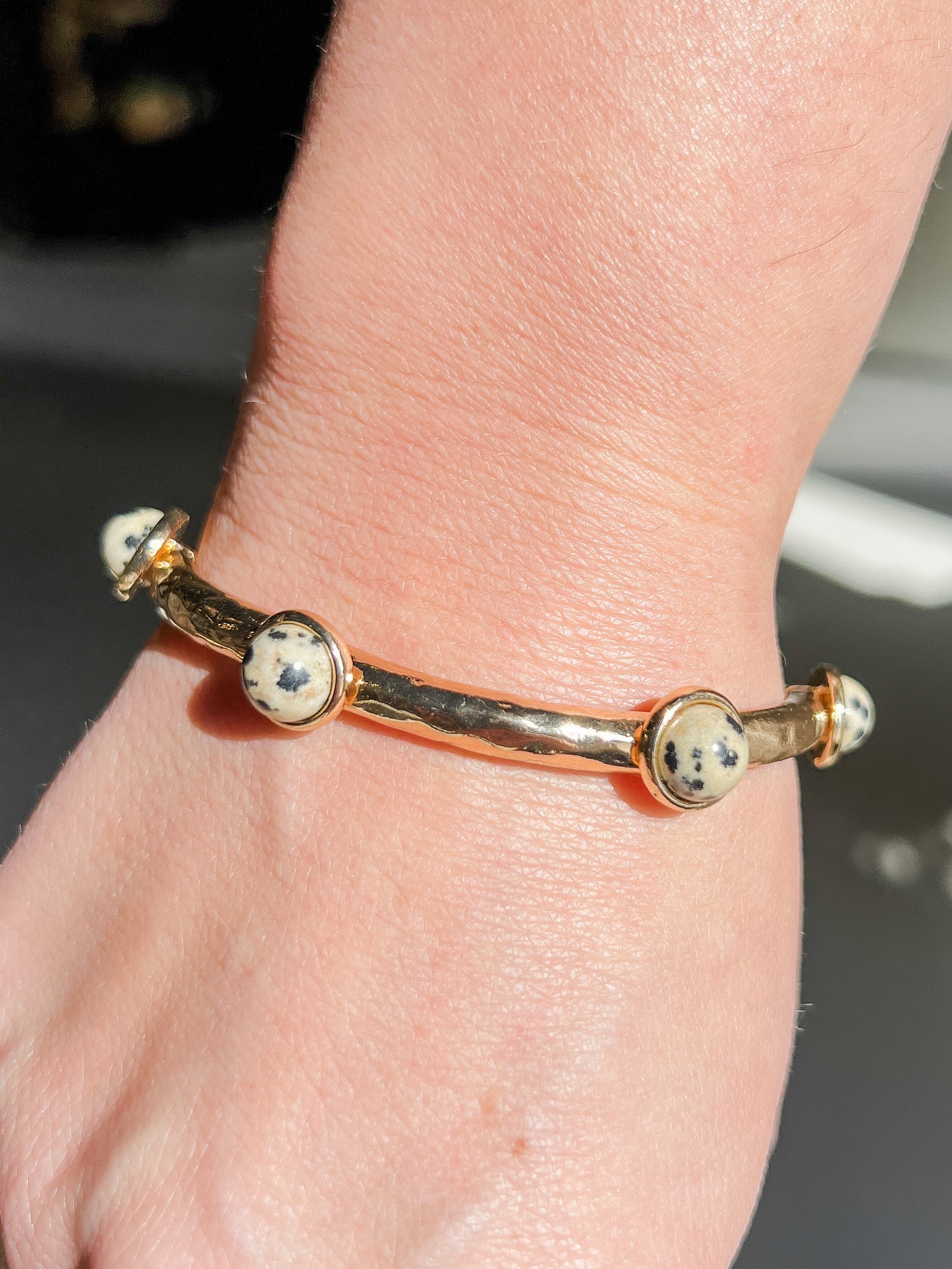 Bangle with semi precious Dalmatian Stones